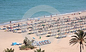 Aerial view of beach and holidaymakers on vacation