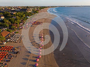 Aerial view of the beach in Seminyak in evening, Bali Island