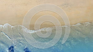 Aerial view with beach in wave of turquoise sea water shot, Top view