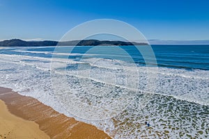 Aerial view at the beach with waves