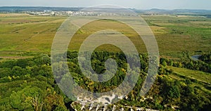 Aerial view of beautiful ancient fortress in forest in summer. Tarakaniv Fort.