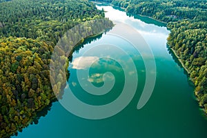 Aerial view of beautiful Balsys lake, one of six Green Lakes, located in Verkiai Regional Park. Birds eye view of scenic emerald