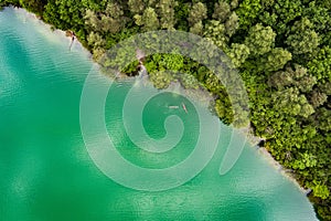 Aerial view of beautiful Balsys lake, one of six Green Lakes, located in Verkiai Regional Park. Birds eye view of scenic emerald