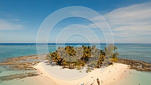 Aerial view beautiful beach on tropical island. Guyam island, Philippines, Siargao.