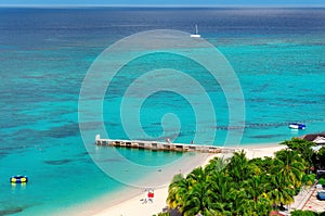 Aerial view on beautiful Caribbean beach and pier in Montego Bay, Jamaica island.