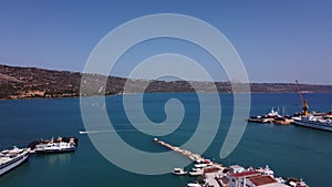 Aerial view of the beautiful city of Chania with it's old harbor and the famous lighthouse, Crete, Greece.