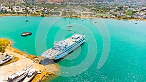 Aerial view of the beautiful city of Chania with it's old harbor and the famous lighthouse, Crete, Greece.