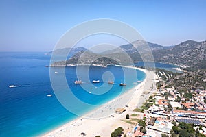 Aerial view of beautiful coasline with white sand and blue water close to Fethiye, Oludeniz photo