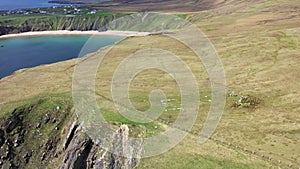 Aerial view of the beautiful coast at Malin Beg with Slieve League in the background in County Donegal - Ireland