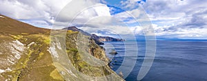 Aerial view of the beautiful coast at Malin Beg with Slieve League in the background in County Donegal, Ireland