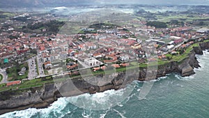 Aerial view of beautiful coastal city of Llanes, Spain in Asturias