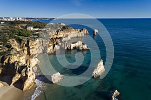 Aerial view of the beautiful coastline near the Prainha Beach in PortimÃÂ£o, Algarve photo
