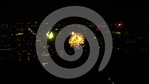 Aerial view on Beautiful Fireworks display in the night sky. View from the sky on Grand fireworks