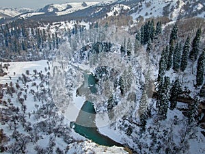 Aerial view of Beautiful forest snow scene in the West Tianshan Mountains in winter