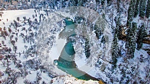 Aerial view of Beautiful forest snow scene in the West Tianshan Mountains in winter