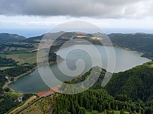 Aerial view of beautiful Furnas lagoon in the Azores islands. Drone landscape view with lines and textures in the background. Top