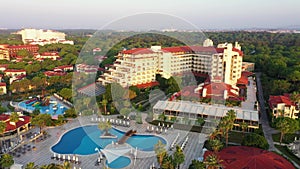 Aerial view of a beautiful hotel with swimming pools at Turkey.