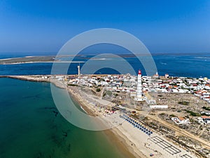 Aerial view of beautiful ilha do Farol lighthouse island, in Algarve. Portugal. photo