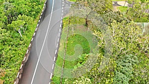 Aerial view of beautiful island forest and road