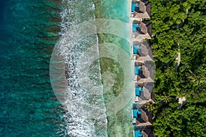 Aerial view of beautiful island at Maldives in the Indian Ocean. Top view from drone
