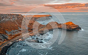 Aerial view on a beautiful morning with sunrise at Giants Causeway, the famous landmark in Northern Ireland UK