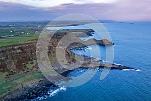 Aerial view on a beautiful morning with sunrise at Giants Causeway, the famous landmark in Northern Ireland UK