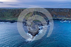 Aerial view on a beautiful morning with sunrise at Giants Causeway, the famous landmark in Northern Ireland UK