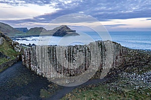 Aerial view on a beautiful morning with sunrise at Giants Causeway, the famous landmark in Northern Ireland UK