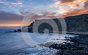 Aerial view on a beautiful morning with sunrise at Giants Causeway, the famous landmark in Northern Ireland UK