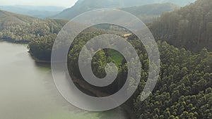 Aerial view beautiful nature with mountains and hills by Lake Mattupetty. Kerala State. Near the city of Munar.