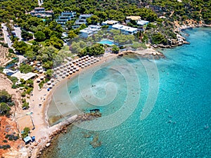 Aerial view of the beautiful Nirides - Zen beach at the bay of Vouliagmeni