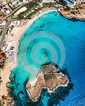 Aerial view of beautiful Nissi beach in Ayia Napa, Cyprus. Nissi beach in Ayia Napa famous tourist beach in Cyprus. A view of a photo