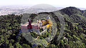 Aerial view of the beautiful Pena Palace (Palacio da Pena) in Sintra, Portugal; Concept for travel in Portugal