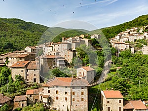 Aerial view of beautiful Raggiolo village, located on the eastern slopes of Pratomagno, surrounded by chestnut forests