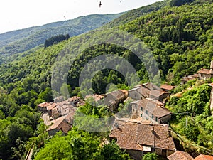 Aerial view of beautiful Raggiolo village, located on the eastern slopes of Pratomagno, surrounded by chestnut forests