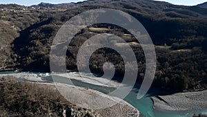 Aerial view of a beautiful river between mountains