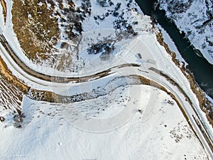 Aerial view of Beautiful S road snow scene in the West Tianshan Mountains in winter