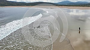 Aerial view of Beautiful Sandy Beach Tullagh Strand on Atlantic Ocean in County Donegal Ireland