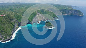 Aerial view of a beautiful scenic Kelingking Beach with a steep cliff