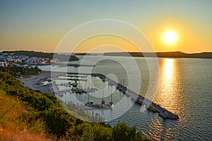 Aerial view of the beautiful seaside city of Pylos located in Messenia, Peloponnese, Greece at sunset