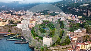 Aerial view of beautiful Sorrento Beach and port at summer sunset, Amalfi Coast - Italy