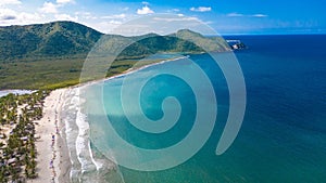 Aerial view of the beautiful sunny Bahia de Patanemo beach in Puerto Cabello, Venezuela photo