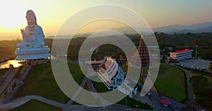 Aerial view beautiful sunset The white big Guanyin statue the biggest in the world at Wat Huay Pla Kang.