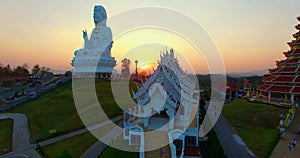 Aerial view beautiful sunset The white big Guanyin statue the biggest in the world at Wat Huay Pla Kang.