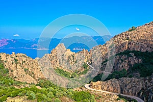 Drone photography of bizarre red rocks in the Calanches above the gulf of Porto, Corsica France