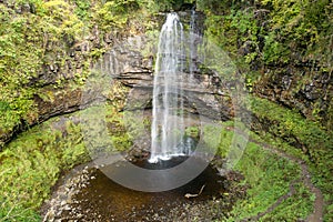 Aerial view of a beautiful waterfall in the Brecon Beacons (Henrhyd Falls