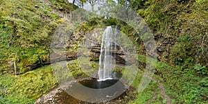 Aerial view of a beautiful waterfall in the Brecon Beacons (Henrhyd Falls