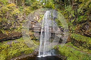 Aerial view of a beautiful waterfall in the Brecon Beacons (Henrhyd Falls