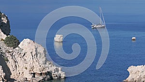 Aerial view of beautiful yacht. Boat on the sea at sunset in summer.