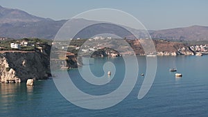 Aerial view of beautiful yacht. Boat on the sea at sunset in summer.